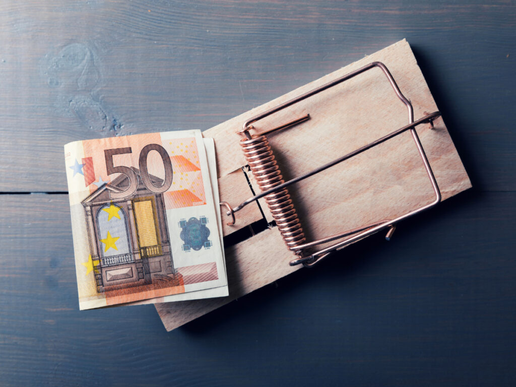A 50 euro banknote on a mousetrap